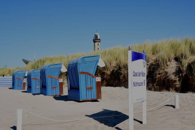 Beach, beach chairs, lighthouse, Warnemünde, Baltic Sea, August 8, 2026, Harbor 35, Hanse Sail, gathering of sailboats and ships, photo, Warnemünde, Baltic Sea