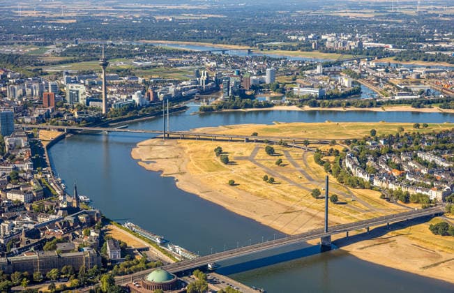 Aerial view, historic low water levels on the Rhine, dried-up Rhine meadows at the Rheinknie Bridge near Oberkassel, Unterrath, Düsseldorf, Ruhr region, North Rhine-Westphalia, Germany ATTENTION: MINIMUM FEE: 60 EUR