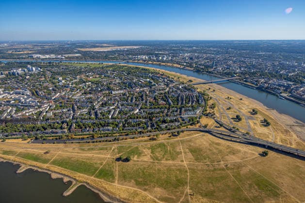 Aerial view, historic low water levels on the Rhine, dried-up Rhine meadows at the Rheinknie Bridge near Oberkassel, Unterrath, Düsseldorf, Ruhr region, North Rhine-Westphalia, Germany ATTENTION: MINIMUM FEE: 60 EUR