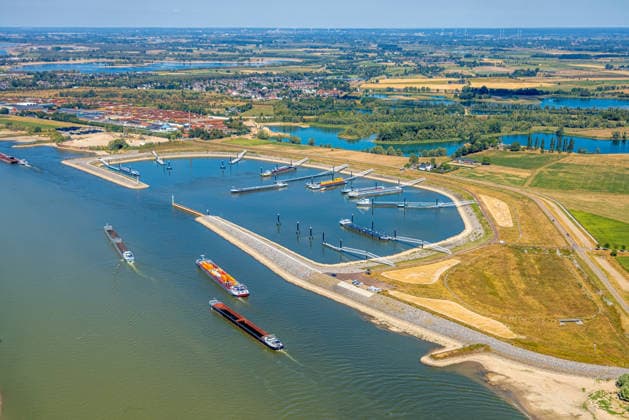 Aerial view, cargo ship stranded in the harbor of Spijk and Tolkamer in the Netherlands; historic low water levels on the Rhine; Salmorth, Kleve, Ruhr region, North Rhine-Westphalia, Germany ATTENTION: MINIMUM FEE: 60 EUR