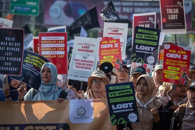 August 9, 2026, Surabaya, Indonesia: SURABAYA, Indonesia Ã¢â‚¬ August 9, 2026: Thousands of demonstrators affiliated with the Alliance of Communities Concerned for the Generation gather on Governor Suryo Street during a rally opposing LGBTQ rights. Participants carried flags and banners expressing opposition to lesbian, gay, bisexual, transgender, and queer (LGBTQ) people and related issues. Surabaya Indonesia - ZUMAq101 20260809_zna_q101_005 Copyright: xMuhammadxIffanxMaulanax