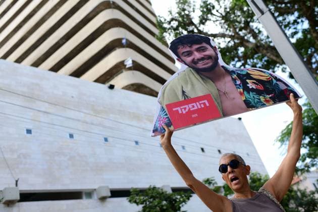 Activists Rally Outside Likud Headquarters in Tel Aviv TEL AVIV, Israel August 9, 2026: Activists demonstrate outside the headquarters of Israel™s ruling Likud party in Tel Aviv, calling for the establishment of a state commission of inquiry to investigate the circumstances and failures surrounding the October 7, 2023 attack. Demonstrators demand an official investigation into the events and the decisions made before and during the attack. Tel-Aviv Israel Copyright: x xTomerxNeubergx xJNAxPressx