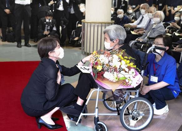 81st A-bomb anniversary in Nagasaki Japanese Prime Minister Sanae Takaichi (L) visits a nursery home for atomic bomb survivors in Nagasaki on Aug. 9, 2026, after attending a memorial ceremony marking the 81st anniversary of the U.S. atomic bombing of the southwestern Japan city in World War II. (Pool photo)  A14AA0005625424P