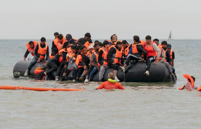 August 9, 2026, Ecault, France: Ecault, France. Migrants board a taxi boat at the beach at Ecault, France, before attempting to cross the English Channel. Ecault France  - ZUMAl94_ 20260809_zaf_l94_044 Copyright: xIoannisxAlexopoulosx