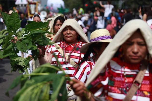 Mexico City marks International Day of the World s Indigenous Peoples MEXICO CITY, MEXICO - AUGUST 09: Participants wearing traditional regional attire perform during the Mega Calenda parade marking the International Day of the World s Indigenous Peoples, on Reforma Avenue, in Mexico City, Mexico on August 09, 2026. ??Hundreds of participants from different indigenous communities in Mexico gathered to celebrate their traditions and commemorate the International Day of the World s Indigenous Peoples, calling for the recognition of their rights, autonomy, and cultural heritage. Daniel Cardenas Anadolu Mexico City Mexico. Editorial use only. Please get in touch for any other usage.  Copyright: x2026xAnadoluxDanielxCardenasx