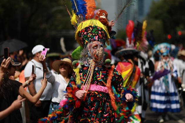 Mexico City marks International Day of the World s Indigenous Peoples MEXICO CITY, MEXICO - AUGUST 09: Participants wearing traditional regional attire perform during the Mega Calenda parade marking the International Day of the World s Indigenous Peoples, on Reforma Avenue, in Mexico City, Mexico on August 09, 2026. ??Hundreds of participants from different indigenous communities in Mexico gathered to celebrate their traditions and commemorate the International Day of the World s Indigenous Peoples, calling for the recognition of their rights, autonomy, and cultural heritage. Daniel Cardenas Anadolu Mexico City Mexico. Editorial use only. Please get in touch for any other usage.  Copyright: x2026xAnadoluxDanielxCardenasx