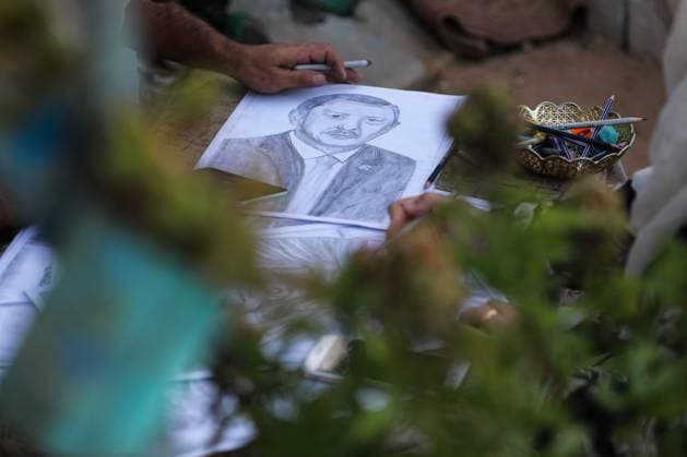 August 10, 2026, Gaza City, Palestine, State of: GAZA Gaza City, GAZA STRIP †AUGUST 9, 2026: Palestinian artist Nadia Abu Issa creates charcoal drawings depicting the hardships experienced by civilians during the war in Gaza, including shortages of food and water and life under continued displacement and insecurity. Living near an area affected by ongoing military activity, Abu Issa says her artwork aims to document the daily realities faced by Palestinians and preserve their experiences through art. Among her recent works is a portrait of Turkish President Recep Tayyip ErdoÄŸan, which she says she created as a gesture of appreciation for Turkeyâ€⠢s support for Palestinians. Gaza City Palestine, State of - ZUMAq101 20260810_zna_q101_008 Copyright: xRamzixAbuxAmerx