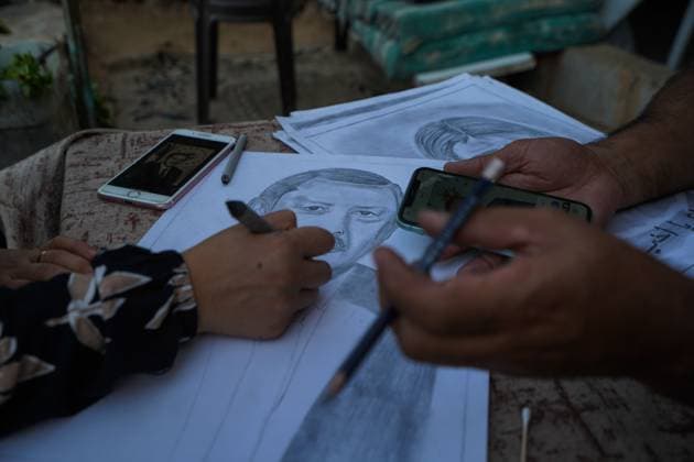 August 9, 2026, Gaza City, Palestine, State of: GAZA Gaza City, GAZA STRIP †AUGUST 9, 2026: Palestinian artist Nadia Abu Issa creates charcoal drawings depicting the hardships experienced by civilians during the war in Gaza, including shortages of food and water and life under continued displacement and insecurity. Living near an area affected by ongoing military activity, Abu Issa says her artwork aims to document the daily realities faced by Palestinians and preserve their experiences through art. Among her recent works is a portrait of Turkish President Recep Tayyip ErdoÄŸan, which she says she created as a gesture of appreciation for Turkeyâ€⠢s support for Palestinians. Gaza City Palestine, State of - ZUMAq101 20260809_zna_q101_140 Copyright: xRamzixAbuxAmerx