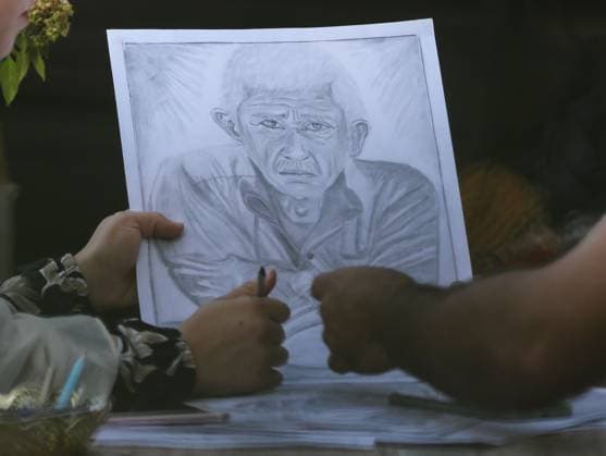 August 10, 2026, Gaza City, Palestine, State of: GAZA Gaza City, GAZA STRIP †AUGUST 9, 2026: Palestinian artist Nadia Abu Issa creates charcoal drawings depicting the hardships experienced by civilians during the war in Gaza, including shortages of food and water and life under continued displacement and insecurity. Living near an area affected by ongoing military activity, Abu Issa says her artwork aims to document the daily realities faced by Palestinians and preserve their experiences through art. Among her recent works is a portrait of Turkish President Recep Tayyip ErdoÄŸan, which she says she created as a gesture of appreciation for Turkeyâ€⠢s support for Palestinians. Gaza City Palestine, State of - ZUMAq101 20260810_zna_q101_009 Copyright: xRamzixAbuxAmerx