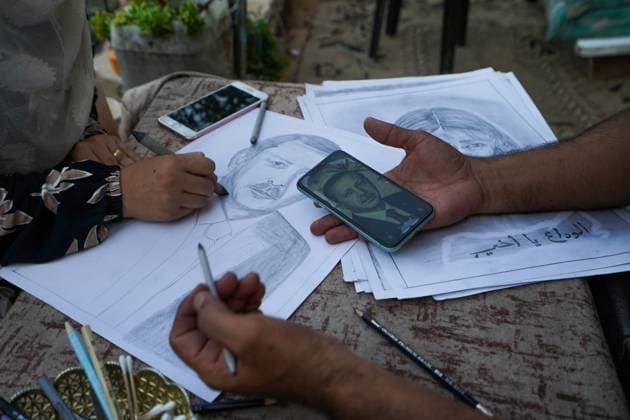 August 9, 2026, Gaza City, Palestine, State of: GAZA Gaza City, GAZA STRIP †AUGUST 9, 2026: Palestinian artist Nadia Abu Issa creates charcoal drawings depicting the hardships experienced by civilians during the war in Gaza, including shortages of food and water and life under continued displacement and insecurity. Living near an area affected by ongoing military activity, Abu Issa says her artwork aims to document the daily realities faced by Palestinians and preserve their experiences through art. Among her recent works is a portrait of Turkish President Recep Tayyip ErdoÄŸan, which she says she created as a gesture of appreciation for Turkeyâ€⠢s support for Palestinians. Gaza City Palestine, State of - ZUMAq101 20260809_zna_q101_147 Copyright: xRamzixAbuxAmerx