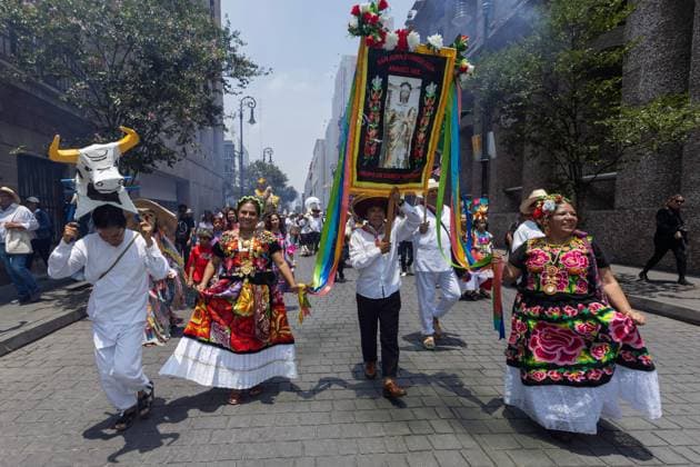 Indigenous Cultures Parade Through Mexico City MEXICO CITY, MEXICO AUGUST 9, 2026: Participants wearing traditional clothing dance and march during the 17th Mega Calenda cultural parade from the Angel of Independence to the Zocalo in Mexico City, August 9, 2026. Organized by the Mexico City government, the event commemorates the International Day of the World s Indigenous Peoples and is part of the 12th Festival of Indigenous Cultures, Indigenous Peoples, and Native Neighborhoods of Mexico City. Mexico City Mexico Copyright: x xCristianxLeyvax xJNAxPressx