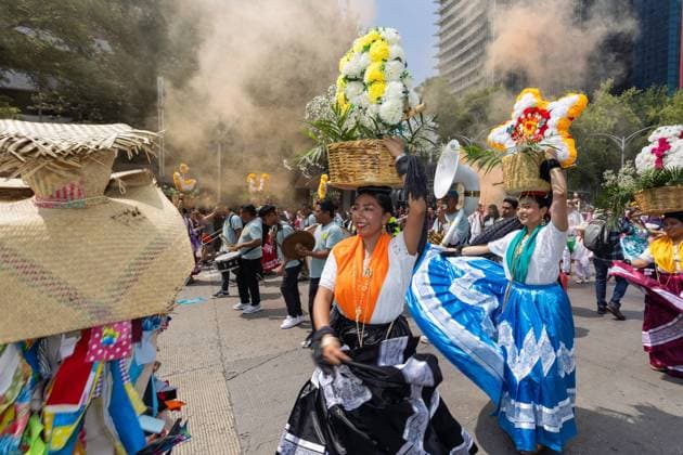 Indigenous Cultures Parade Through Mexico City MEXICO CITY, MEXICO AUGUST 9, 2026: Participants wearing traditional clothing dance and march during the 17th Mega Calenda cultural parade from the Angel of Independence to the Zocalo in Mexico City, August 9, 2026. Organized by the Mexico City government, the event commemorates the International Day of the World s Indigenous Peoples and is part of the 12th Festival of Indigenous Cultures, Indigenous Peoples, and Native Neighborhoods of Mexico City. Mexico City Mexico Copyright: x xCristianxLeyvax xJNAxPressx