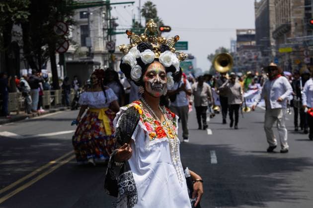 August 9, 2026, Mexico City, Mexico: MEXICO Mexico City, MEXICO †AUGUST 9, 2026: Participants wearing traditional clothing dance and march during the 17th Mega Calenda cultural parade from the Angel of Independence to the Zocalo in Mexico City, August 9, 2026. Organized by the Mexico City government, the event commemorates the International Day of the World s Indigenous Peoples and is part of the 12th Festival of Indigenous Cultures, Indigenous Peoples, and Native Neighborhoods of Mexico City. Mexico City Mexico - ZUMAq101 20260809_zna_q101_157 Copyright: xCristianxLeyvax