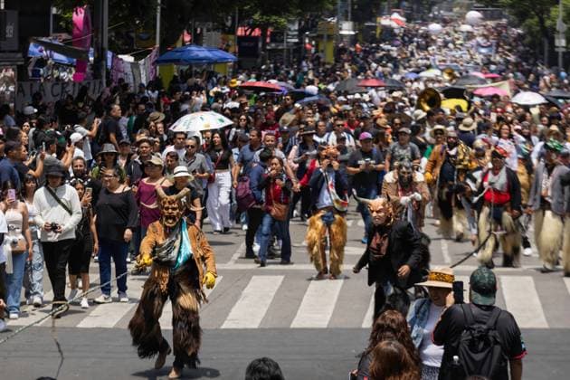 August 9, 2026, Mexico City, Mexico: MEXICO Mexico City, MEXICO †AUGUST 9, 2026: Participants wearing traditional clothing dance and march during the 17th Mega Calenda cultural parade from the Angel of Independence to the Zocalo in Mexico City, August 9, 2026. Organized by the Mexico City government, the event commemorates the International Day of the World s Indigenous Peoples and is part of the 12th Festival of Indigenous Cultures, Indigenous Peoples, and Native Neighborhoods of Mexico City. Mexico City Mexico - ZUMAq101 20260809_zna_q101_161 Copyright: xCristianxLeyvax