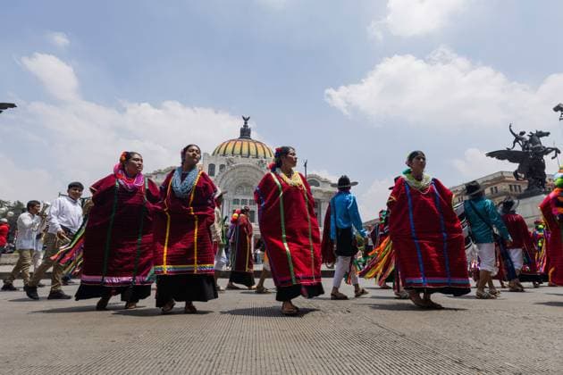 August 9, 2026, Mexico City, Mexico: MEXICO Mexico City, MEXICO †AUGUST 9, 2026: Participants wearing traditional clothing dance and march during the 17th Mega Calenda cultural parade from the Angel of Independence to the Zocalo in Mexico City, August 9, 2026. Organized by the Mexico City government, the event commemorates the International Day of the World s Indigenous Peoples and is part of the 12th Festival of Indigenous Cultures, Indigenous Peoples, and Native Neighborhoods of Mexico City. Mexico City Mexico - ZUMAq101 20260809_zna_q101_163 Copyright: xCristianxLeyvax