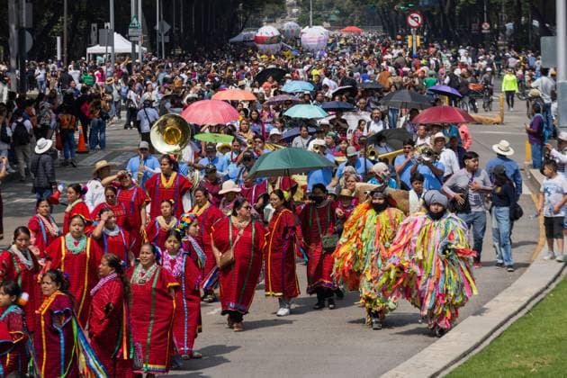 August 9, 2026, Mexico City, Mexico: MEXICO Mexico City, MEXICO †AUGUST 9, 2026: Participants wearing traditional clothing dance and march during the 17th Mega Calenda cultural parade from the Angel of Independence to the Zocalo in Mexico City, August 9, 2026. Organized by the Mexico City government, the event commemorates the International Day of the World s Indigenous Peoples and is part of the 12th Festival of Indigenous Cultures, Indigenous Peoples, and Native Neighborhoods of Mexico City. Mexico City Mexico - ZUMAq101 20260809_zna_q101_164 Copyright: xCristianxLeyvax
