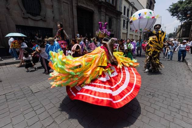 August 9, 2026, Mexico City, Mexico: MEXICO Mexico City, MEXICO †AUGUST 9, 2026: Participants wearing traditional clothing dance and march during the 17th Mega Calenda cultural parade from the Angel of Independence to the Zocalo in Mexico City, August 9, 2026. Organized by the Mexico City government, the event commemorates the International Day of the World s Indigenous Peoples and is part of the 12th Festival of Indigenous Cultures, Indigenous Peoples, and Native Neighborhoods of Mexico City. Mexico City Mexico - ZUMAq101 20260809_zna_q101_176 Copyright: xCristianxLeyvax