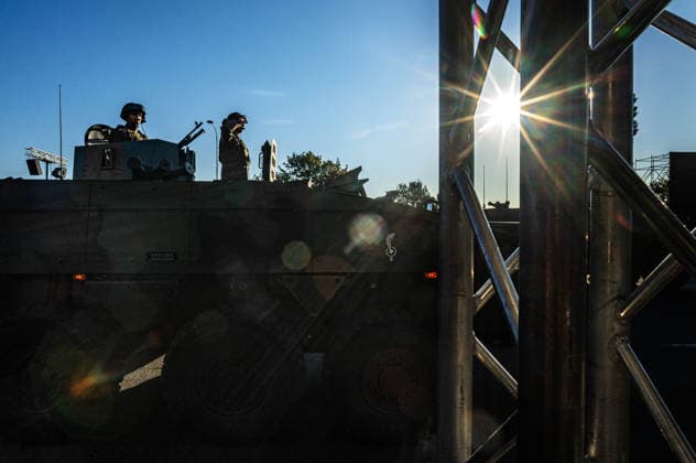 August 9, 2026, Warsaw, Mazovia, Poland: Soldiers atop an armoured vehicle salute during the parade rehearsal. Early in the morning of 9th August, Poland s armed forces, and those of allies stationed in the country, take part in a rehearsal in preparation for a parade on National Armed Forces Day on the 15th August. Soldiers muster as the sun rises over the Vistula River and march past grandstands prepared for dignitaries. The soldiers were followed by mechanised divisions travelling in tanks and a variety of armoured vehicles. Afterwards, Secretary of State in the Ministry of Defence, Pawel Bejda addresses a post-rehearsal press conference, where he is accompanied by the Chief of the General Staff of the Polish Armed Forces, General Wiesla  - ZUMAs197 20260809_aaa_s197_081 Copyright: xNeilxMiltonx