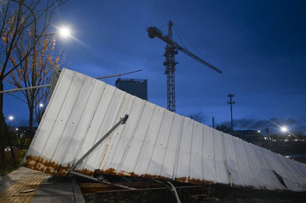 HANGZHOU, CHINA - AUGUST 10: Construction site hoardings are blown down by Typhoon Dolphin on August 10, 2026 in Hangzhou, Zhejiang Province of China. The 13th typhoon of the year brought strong winds and heavy rain to the city, causing damaged facilities, uprooted trees and waterlogged roads.  Copyright: xChinaxNewsxServicex 111659086903