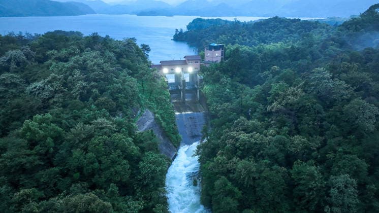 HUZHOU, CHINA - AUGUST 09: The Duihekou Reservoir opens its sluice gates to release floodwaters to brace for Typhoon Dolphin on August 9, 2026 in Deqing County, Huzhou City, Zhejiang Province of China. Typhoon Dolphin, the 13th typhoon of the year, made landfall at Yuhuan of Taizhou City, east China s Zhejiang Province, at around 5:30 p.m. on August 9.  Copyright: xVCGx 111658995577