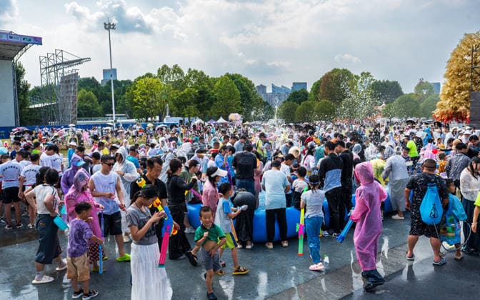 GUIYANG, CHINA - AUGUST 09: Citizens and tourists splash water on each other during the Summer Wonderland Ethnic Group Celebration at Guanshanhu Park on August 9, 2026 in Guiyang, Guizhou Province of China. The event features water splashing activities allowing participants to cool off during the summer heat.  Copyright: xVCGx 111659117637