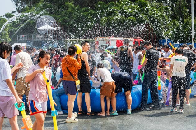 GUIYANG, CHINA - AUGUST 09: Citizens and tourists splash water on each other during the Summer Wonderland Ethnic Group Celebration at Guanshanhu Park on August 9, 2026 in Guiyang, Guizhou Province of China. The event features water splashing activities allowing participants to cool off during the summer heat.  Copyright: xVCGx 111659117628