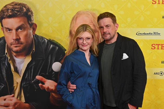 Sebastian BEZZEL, actor, with his wife Johanna Christine GEHLEN, actress, at the world premiere of *STECKERLFISCHFIASKO* on August 10, 20226, at the Mathaeser Kino in Munich. Red Carpet