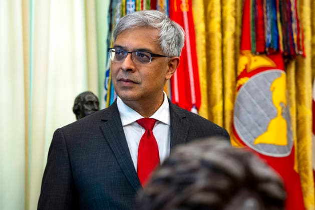 Director of the National Institutes of Health Jay Bhattacharya looks on during an executive order that reevaluates childhood vaccines in the Oval Office of the White House in Washington, DC on August 10, 2026. While the executive order still recommends childhood vaccines for 11 diseases, including measles and polio, it calls for limiting vaccines for other diseases, like hepatitis A and B and meningococcal disease, to high-risk populations.  WAP20260810352 BONNIExCASH