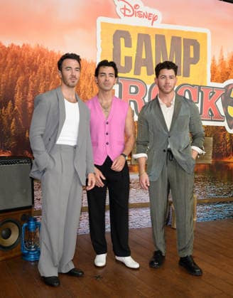 BURBANK, USA, August 10, 2026: Kevin Jonas, Joe Jonas, and Nick Jonas at the world premiere of Disney s *Camp Rock 3* at the Walt Disney Studio Lot. Photo by Paul Smith, Featureflash 458817, August 10, 2026, Burbank, CA Copyright: xPaulxSmithx xFeaturesxFlashx xStarfacex STAR_458817_001