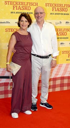 Janina Hartwig with her boyfriend Alexander Putz at the world premiere of *Steckerlfischfiasko* at the Mathaeser Filmpalast in Munich on August 10, 2026