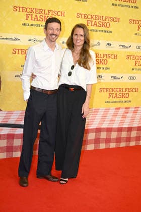 Oliver Berben with his wife Katrin at the world premiere of *Steckerlfischfiasko* at the Mathaeser Filmpalast in Munich on August 10, 2026