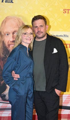 Sebastian Bezzel with his wife Johanna Christine Gehlen at the world premiere of *Steckerlfischfiasko* at the Mathaeser Filmpalast in Munich on August 10, 2026