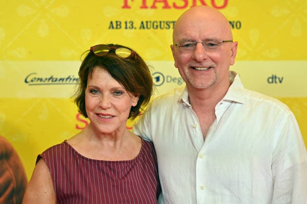 Janina HARTWIG, actress, with her partner Alexander PUTZ, mayor of Landshut; world premiere of *STECKERLFISCHFIASKO* on August 10, 20226, at the Mathaeser Kino in Munich; red carpet