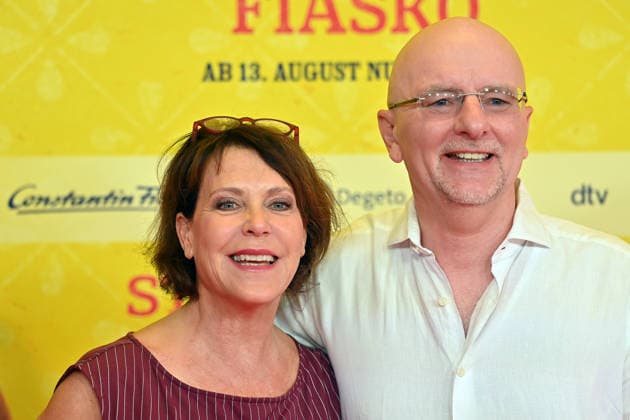 Janina HARTWIG, actress, with her partner Alexander PUTZ, mayor of Landshut; world premiere of *STECKERLFISCHFIASKO* on August 10, 20226, at the Mathaeser Kino in Munich; red carpet