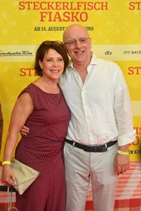 Janina HARTWIG, actress, with her partner Alexander PUTZ, mayor of Landshut; world premiere of *STECKERLFISCHFIASKO* on August 10, 20226, at the Mathaeser Kino in Munich; red carpet