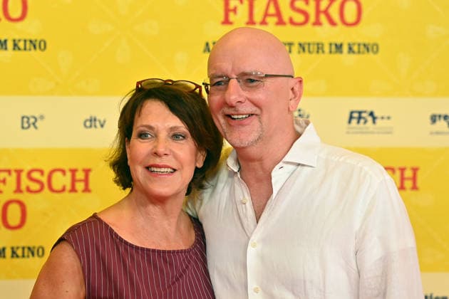 Janina HARTWIG, actress, with her partner Alexander PUTZ, mayor of Landshut; world premiere of *STECKERLFISCHFIASKO* on August 10, 20226, at the Mathaeser Kino in Munich; red carpet