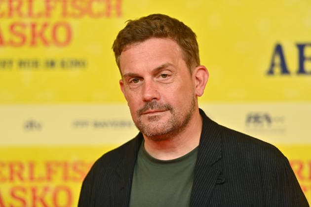 Sebastian BEZZEL, actor; still image, cropped single shot, portrait; World Premiere of *STECKERLFISCHFIASKO* on August 10, 20226, at the Mathäuser Kino in Munich; Red Carpet
