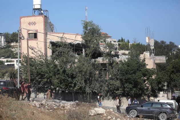Israeli army demolishes a Palestinian home in Nablus, Palestine - 11 Aug 2026 People seen inspecting the house after it was demolished by Israeli forces. Israeli army demolished the home of a Palestinian accused of carrying out an armed attack that killed an Israeli soldier and a Jewish settler in the village of Tell. Nablus Palestine Copyright: xNasserxishatyehx xSOPAxImagesx Nishtayeh35