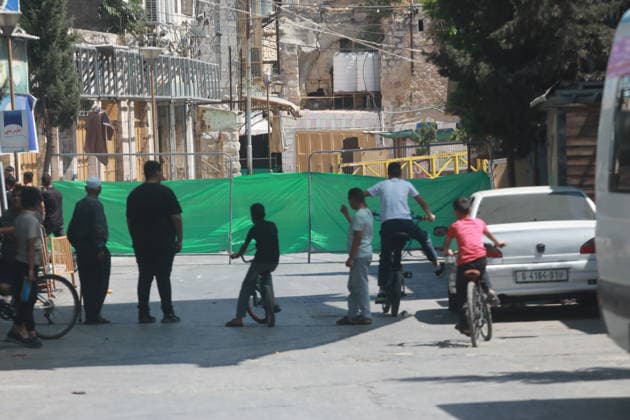Israeli Forces Restrict Palestinian Movement in Hebron Old City Israeli soldiers deploy in the streets of the Old City of Hebron, in the occupied West Bank, on August 11, 2026, as Israeli forces close several entrances and roads and restrict the movement of Palestinians. The measures coincide with Israeli settlers entering the Old City. Photo by Mamoun Wazwaz apaimages Hebron West Bank Palestinian Territory 110826_Hebron_MW_00(28) Copyright: xapaimagesxMamounxWazwazx xapaimagesx