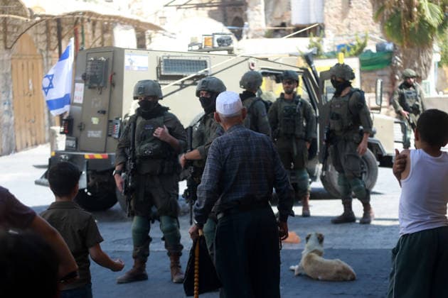 Israeli Forces Restrict Palestinian Movement in Hebron Old City Israeli soldiers deploy in the streets of the Old City of Hebron, in the occupied West Bank, on August 11, 2026, as Israeli forces close several entrances and roads and restrict the movement of Palestinians. The measures coincide with Israeli settlers entering the Old City. Photo by Mamoun Wazwaz apaimages Hebron West Bank Palestinian Territory 110826_Hebron_MW_00(46) Copyright: xapaimagesxMamounxWazwazx xapaimagesx