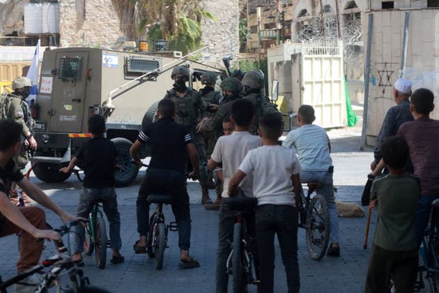 Israeli Forces Restrict Palestinian Movement in Hebron Old City Israeli soldiers deploy in the streets of the Old City of Hebron, in the occupied West Bank, on August 11, 2026, as Israeli forces close several entrances and roads and restrict the movement of Palestinians. The measures coincide with Israeli settlers entering the Old City. Photo by Mamoun Wazwaz apaimages Hebron West Bank Palestinian Territory 110826_Hebron_MW_00(48) Copyright: xapaimagesxMamounxWazwazx xapaimagesx
