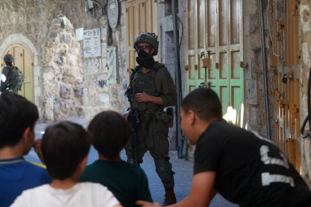 Israeli Forces Restrict Palestinian Movement in Hebron Old City Israeli soldiers deploy in the streets of the Old City of Hebron, in the occupied West Bank, on August 11, 2026, as Israeli forces close several entrances and roads and restrict the movement of Palestinians. The measures coincide with Israeli settlers entering the Old City. Photo by Mamoun Wazwaz apaimages Hebron West Bank Palestinian Territory 110826_Hebron_MW_00(5) Copyright: xapaimagesxMamounxWazwazx xapaimagesx