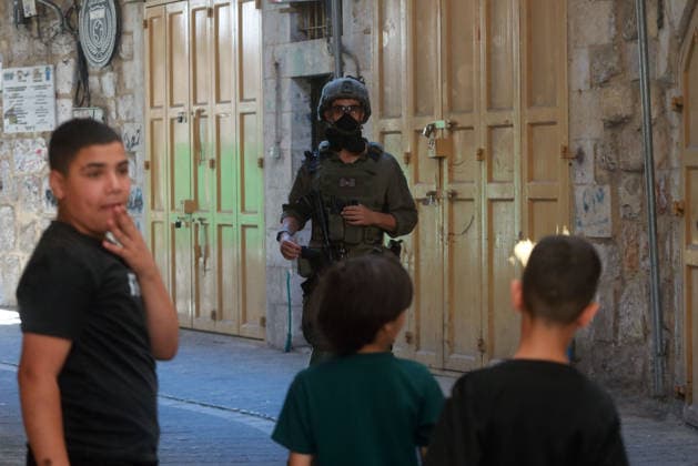Israeli Forces Restrict Palestinian Movement in Hebron Old City Israeli soldiers deploy in the streets of the Old City of Hebron, in the occupied West Bank, on August 11, 2026, as Israeli forces close several entrances and roads and restrict the movement of Palestinians. The measures coincide with Israeli settlers entering the Old City. Photo by Mamoun Wazwaz apaimages Hebron West Bank Palestinian Territory 110826_Hebron_MW_00(7) Copyright: xapaimagesxMamounxWazwazx xapaimagesx