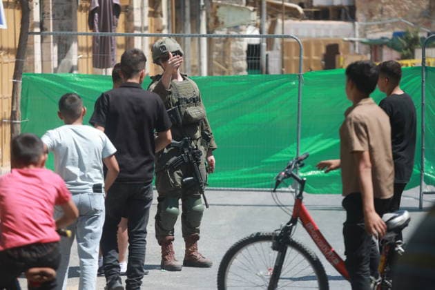 Israeli Forces Restrict Palestinian Movement in Hebron Old City Israeli soldiers deploy in the streets of the Old City of Hebron, in the occupied West Bank, on August 11, 2026, as Israeli forces close several entrances and roads and restrict the movement of Palestinians. The measures coincide with Israeli settlers entering the Old City. Photo by Mamoun Wazwaz apaimages Hebron West Bank Palestinian Territory 110826_Hebron_MW_00(35) Copyright: xapaimagesxMamounxWazwazx xapaimagesx