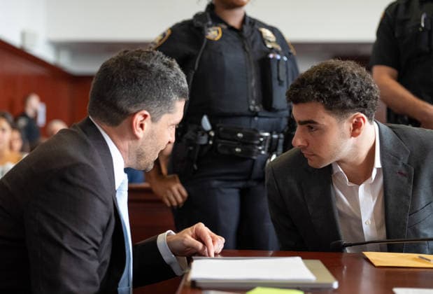 Luigi Mangione talks to one of his lawyers in Manhattan Supreme Court Tuesday, August 11, 2026 in Manhattan, New York. Mangione is on trial for the 2024 killing of UnitedHealthcare CEO Brian Thompson. Pool  NYX20260811207 BARRYxWILLIAMS