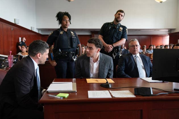 Luigi Mangione talks to one of his lawyers in Manhattan Supreme Court Tuesday, August 11, 2026 in Manhattan, New York. Mangione is on trial for the 2024 killing of UnitedHealthcare CEO Brian Thompson. Pool  NYX20260811213 BARRYxWILLIAMS