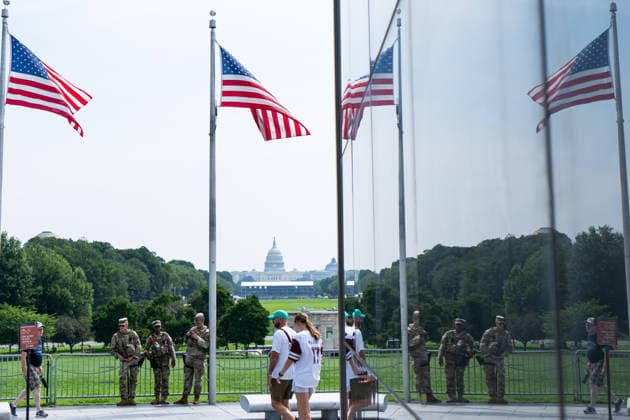 National Guard in DC Anniversary UNITED STATES - AUGUST 11: National Guard troops stand at the base of the Washington Monument on Aug. 11, 2026, in Washington. The National Guard was mobilized to DC a year ago on Aug. 11, 2025. (Bill Clark CQ Roll Call) Washington DC United States EDITORIAL USE ONLY Copyright: x 2026xCQxRollxCallx BillxClarkx rollcallpix172452