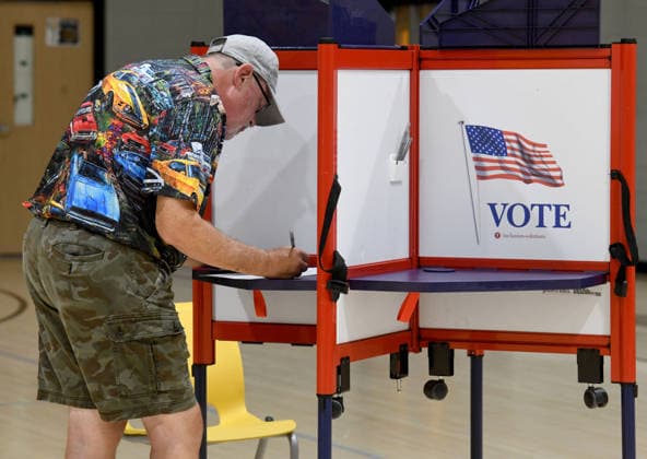 August 11, 2026, Racine, Wisconsin, USA: ROBB LUEHR votes at Jerstad Agerholm School in Racine in the Wisconsin primary election Tuesday August 11, 2026. National focus is on the Democratic gubernatorial primary and on efforts to flip several Republican congressional seats, including that of incumbent Bryan Steil who represents the First Congressional District, including Racine County. Racine USA - ZUMAh154 20260811_znp_h154_014 Copyright: xMarkxHertzbergx
