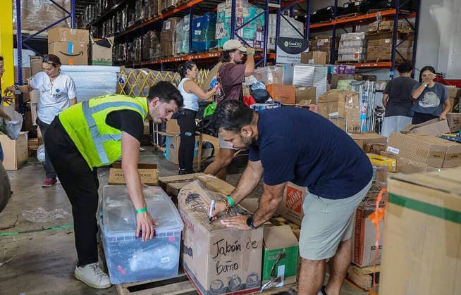 US-NEWS-COLOMBIA-EARTHQUAKE-US-AID-2-MI Volunteers filled boxes with supplies of aid for the victims in Colombia, as a press conference held by Michael Capponi, founder of the Global Empowerment Mission (GEM), was taking place to detail the urgent relief operations and a call for local volunteers and the need of donations a day after the devastating 7.4-magnitude earthquake that struck western Colombia on Aug. 10, at the organization™s headquarters in Doral, Florida, on Tuesday, Aug. 11, 2026. (Pedro Portal Miami Herald TNS) FL USA EDITORIAL USE ONLY Copyright: x@PPORTALx 181794388W PedroxPortalx krtphotoslive965903