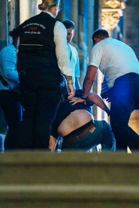 Germany, Aachen: Program for the World Equestrian Championships, World Championships, FEI, World Championships Special in the Old Town, concerts, Ferris wheel, market, Katschhof; Security personnel subdue an unknown man on the town hall steps who was trying to hang a banner; security Copyright: xThiemoxRudolphx